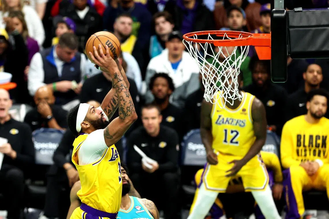 Anthony Davis of the Los Angeles Lakers dunking the ball during the first half of the 124-118 NBA win over the Charlotte Hornets at Spectrum Centre on Feb 5.