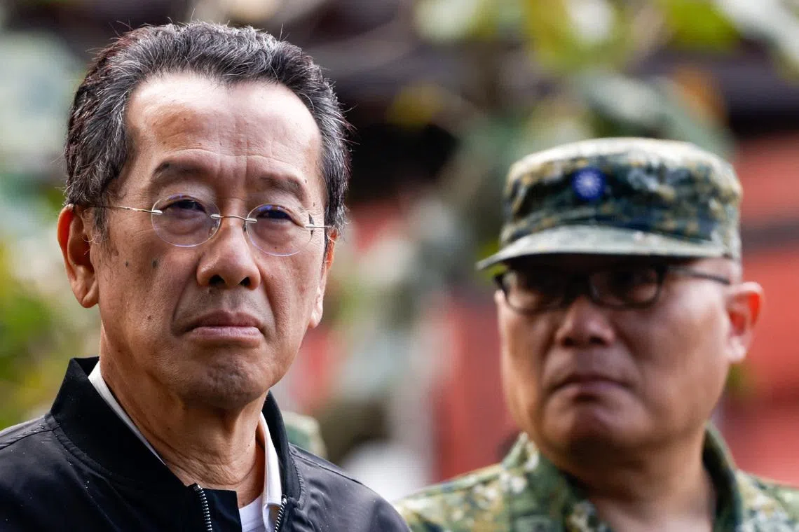 FILE PHOTO: Taiwan Defence Minister Wellington Koo inspects reservists during a training session at Loung Te Industrial Parks Service Center in Yilan, Taiwan December 2, 2025. REUTERS/Ann Wang/File Photo