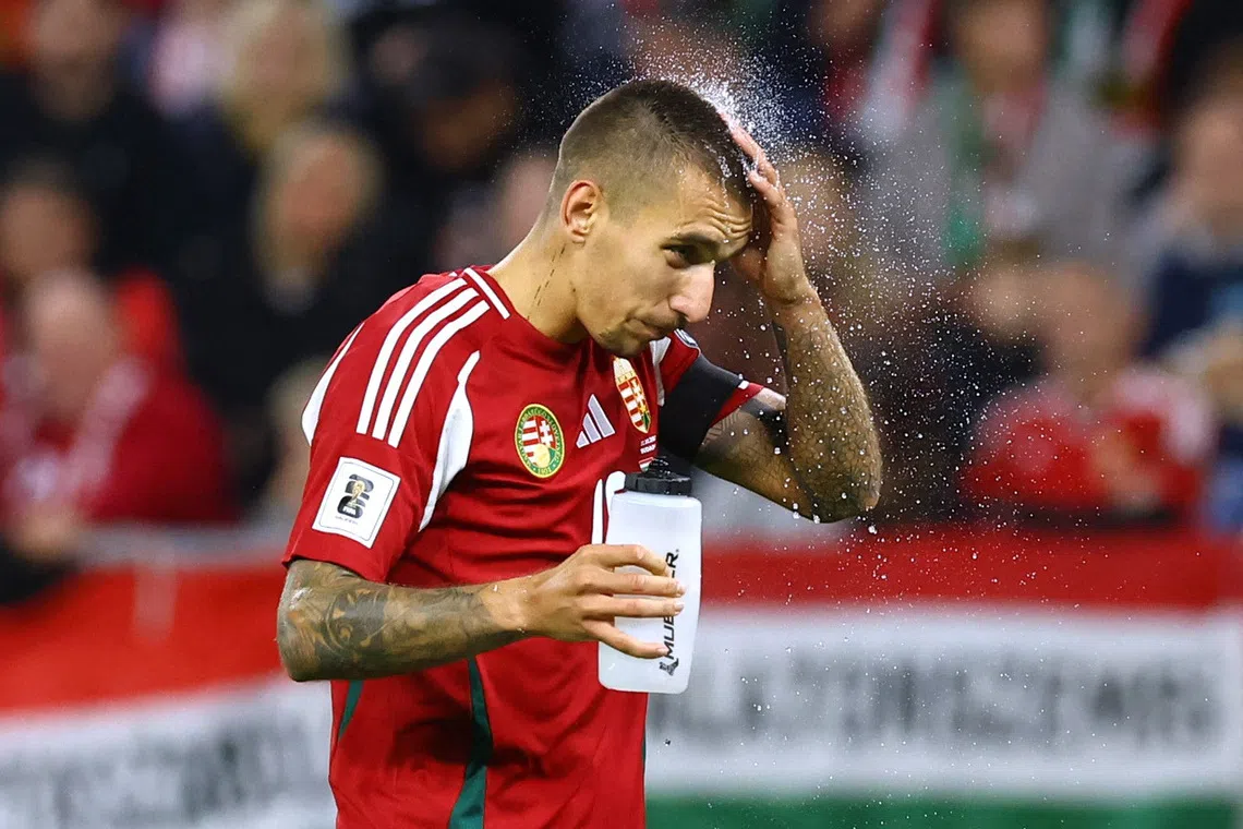Soccer Football - FIFA World Cup - UEFA Qualifiers - Group F - Hungary v Armenia - Puskas Arena, Budapest, Hungary - October 11, 2025  Hungary's Daniel Lukacs during a water break REUTERS/Bernadett Szabo