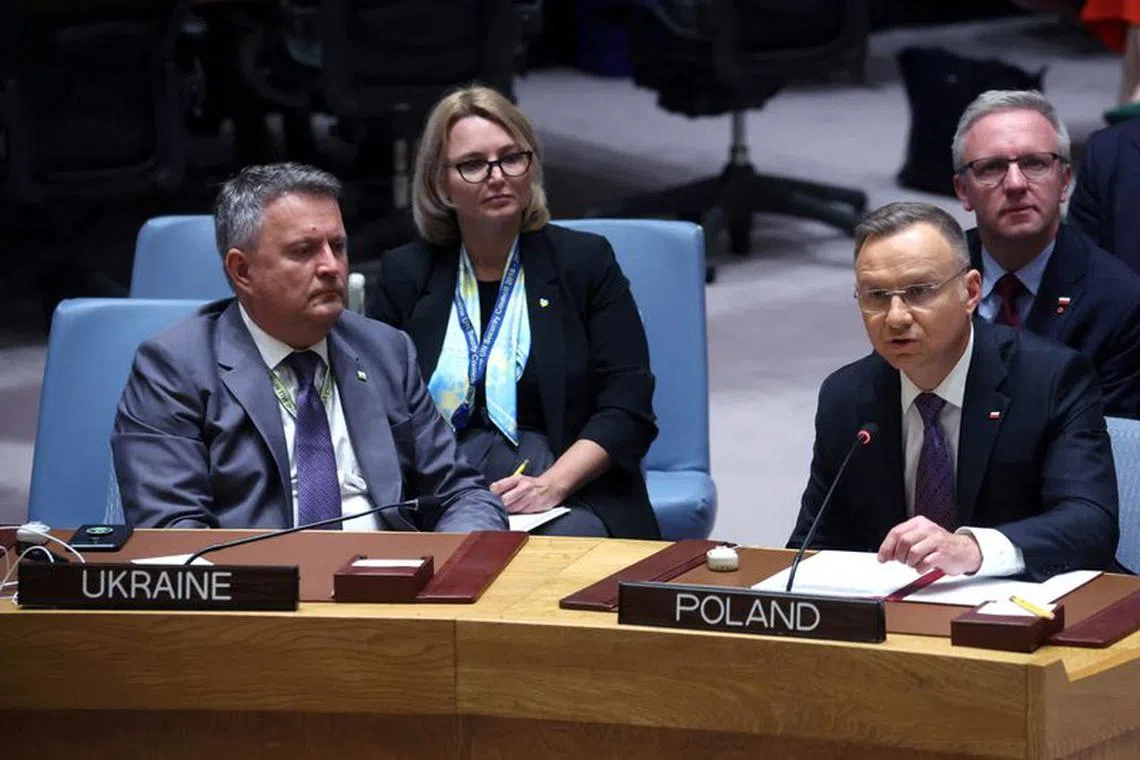 FILE PHOTO: Poland's President Andrzej Duda speaks next to Ukraine's Ambassador to the United Nations Sergіy Kyslytsya during a ministerial level meeting of the U.N. Security Council on the crisis in Ukraine at U.N. headquarters in New York, September 20, 2023. REUTERS/Mike Segar/File Photo