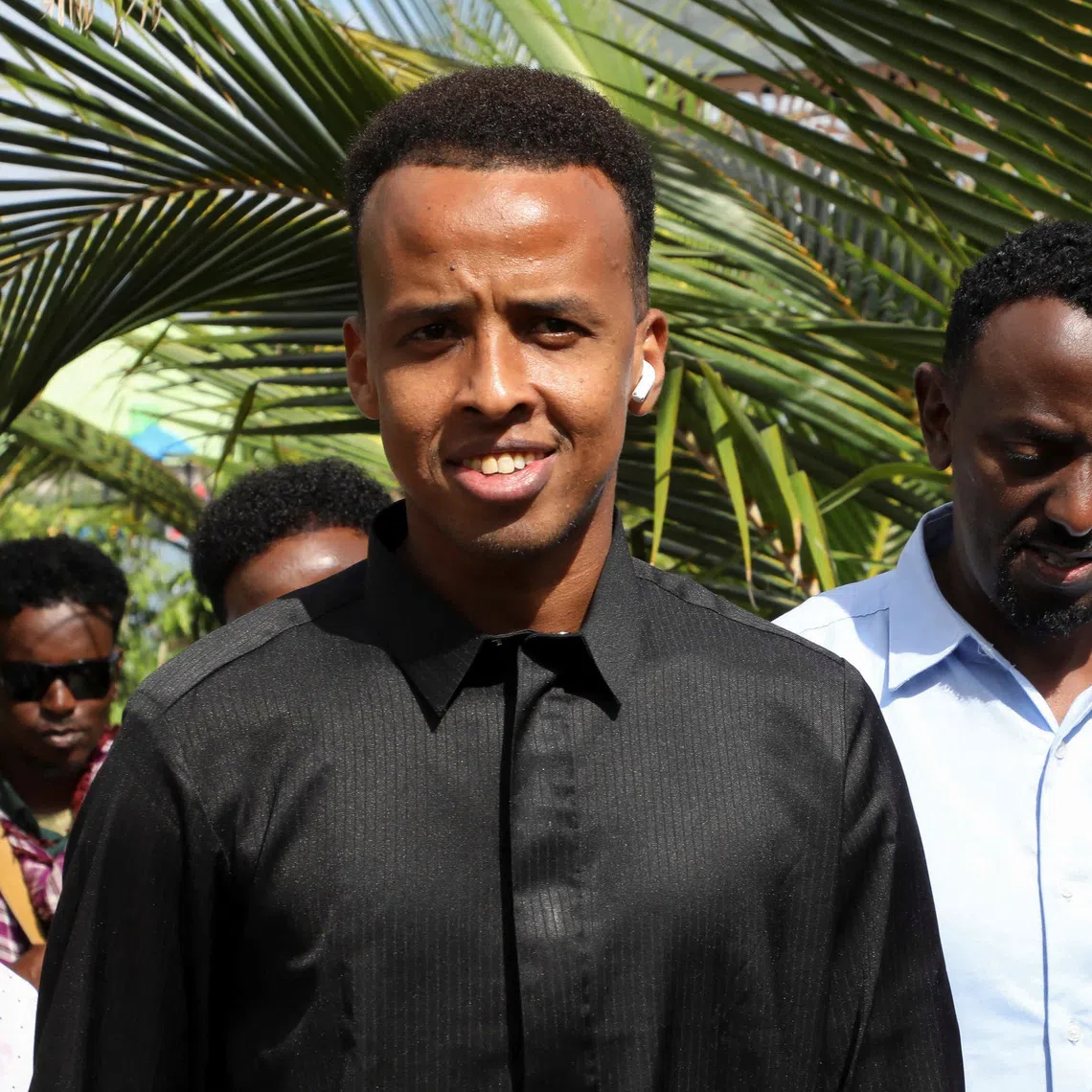 FILE PHOTO: Somali referee Omar Abdulkadir Artan, who was expected to officiate at matches during the 2026 FIFA World Cup but was denied entry to U.S., is hosted in a reception ceremony by members of the Somali community of Dayniile district, in Mogadishu, Somalia June 12, 2026 REUTERS/Feisal Omar/ File Photo