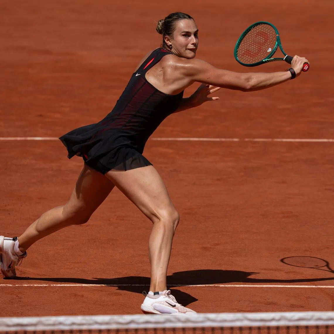 FILE PHOTO: May 30, 2026; Paris, France; Aryna Sabalenka returns a shot during her match against Daria Kasatkina of Australia on day seven at Stade Roland Garros. Mandatory Credit: Susan Mullane-Imagn Images/ File Photo