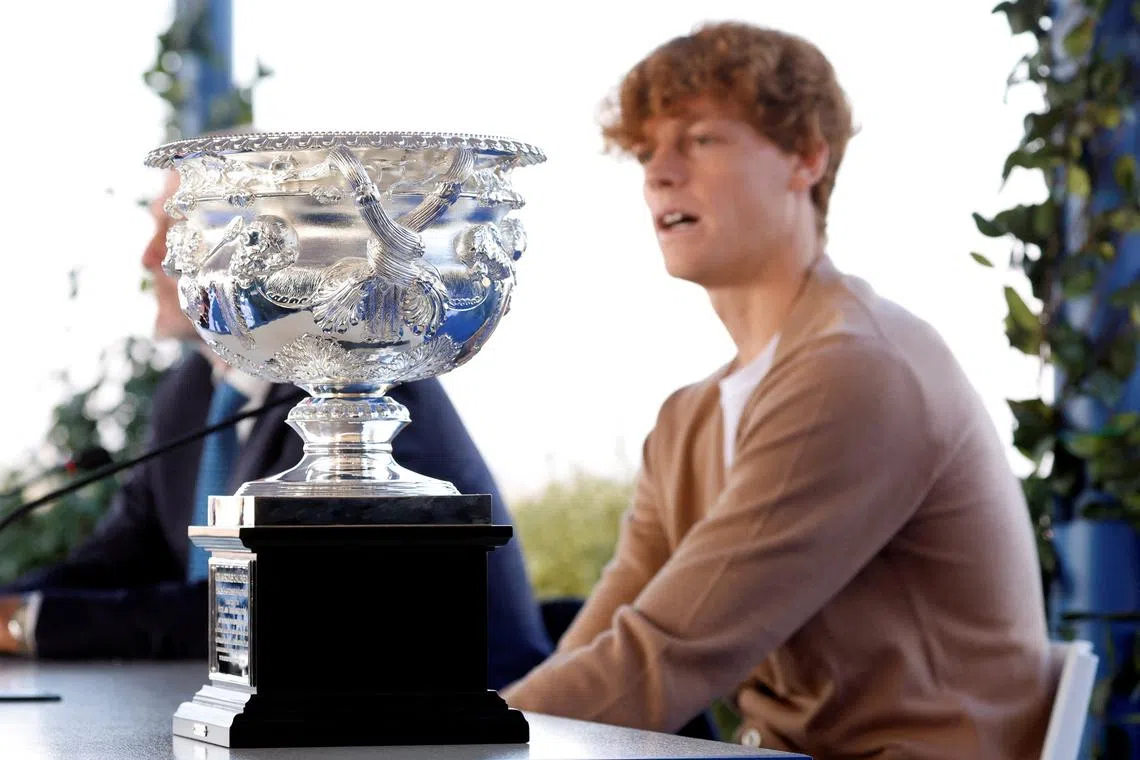 FILE PHOTO: Tennis - Australian Open Winner Jannik Sinner Press Conference - Rome, Italy - January 31, 2024 Australian Open men's singles winner Italy's Jannik Sinner with the trophy during the press conference REUTERS/Remo Casilli/File Photo