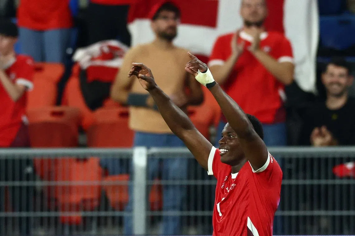 Soccer Football - World Cup - UEFA Qualifiers - Group B - Switzerland v Slovenia - St. Jakob-Park, Basel, Switzerland - September 8, 2025 Switzerland's Breel Embolo celebrates scoring their second goal REUTERS/Denis Balibouse