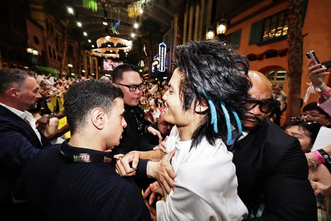 Australian national Johnson Wen jumped the barricade at a fan meet with the cast of Wicked: For Good on Nov 13, and was promptly caught by security.