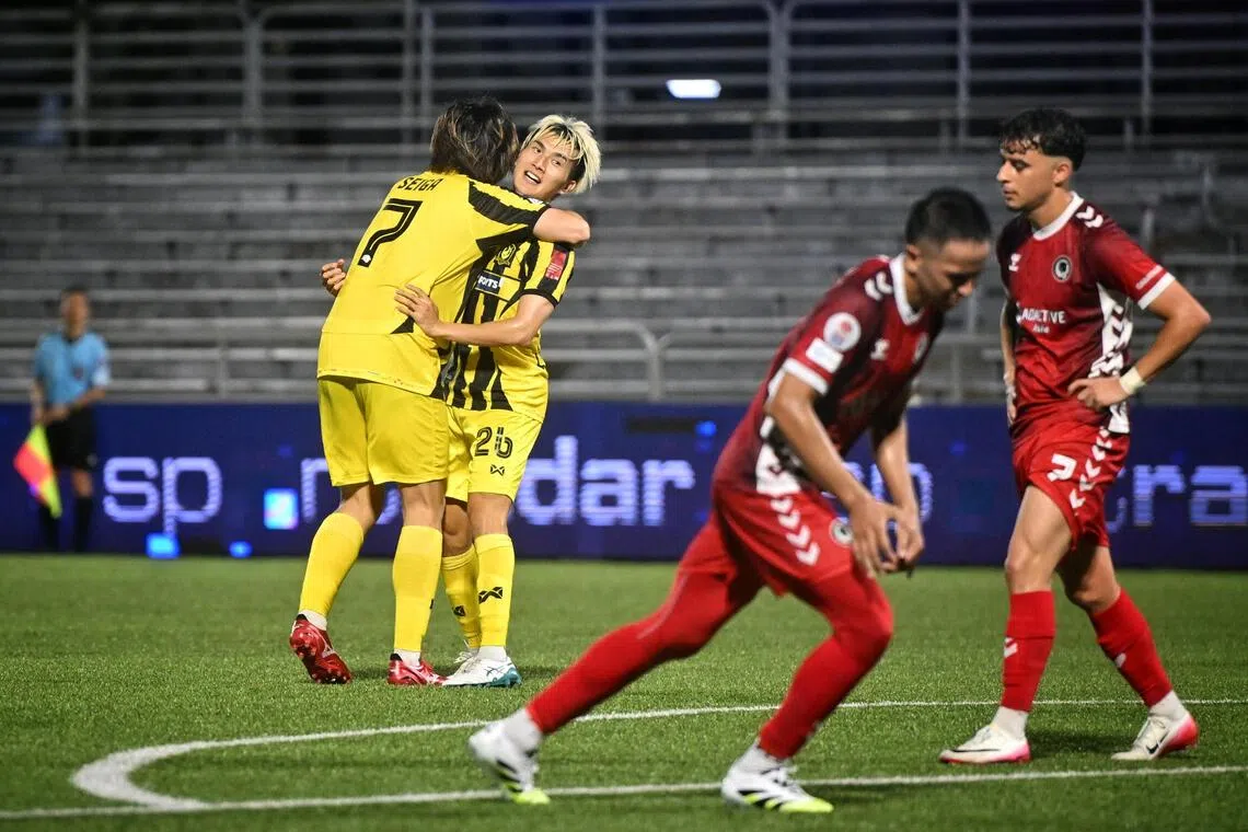 BG Tampines Rovers left-back Takeshi Yoshimoto (second from left) celebrates with Seiga Sumi after scoring the opener in the 3-0 win over Tanjong Pagar United at the Jurong East Stadium.