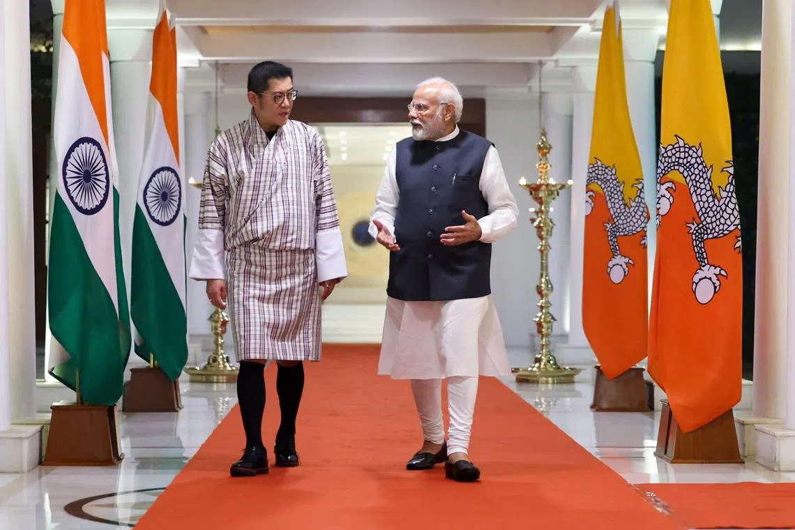 Bhutan's King Jigme Khesar Namgyel Wangchuck (left) meeting Indian Prime Minister Narendra Modi in New Delhi on Nov 6.