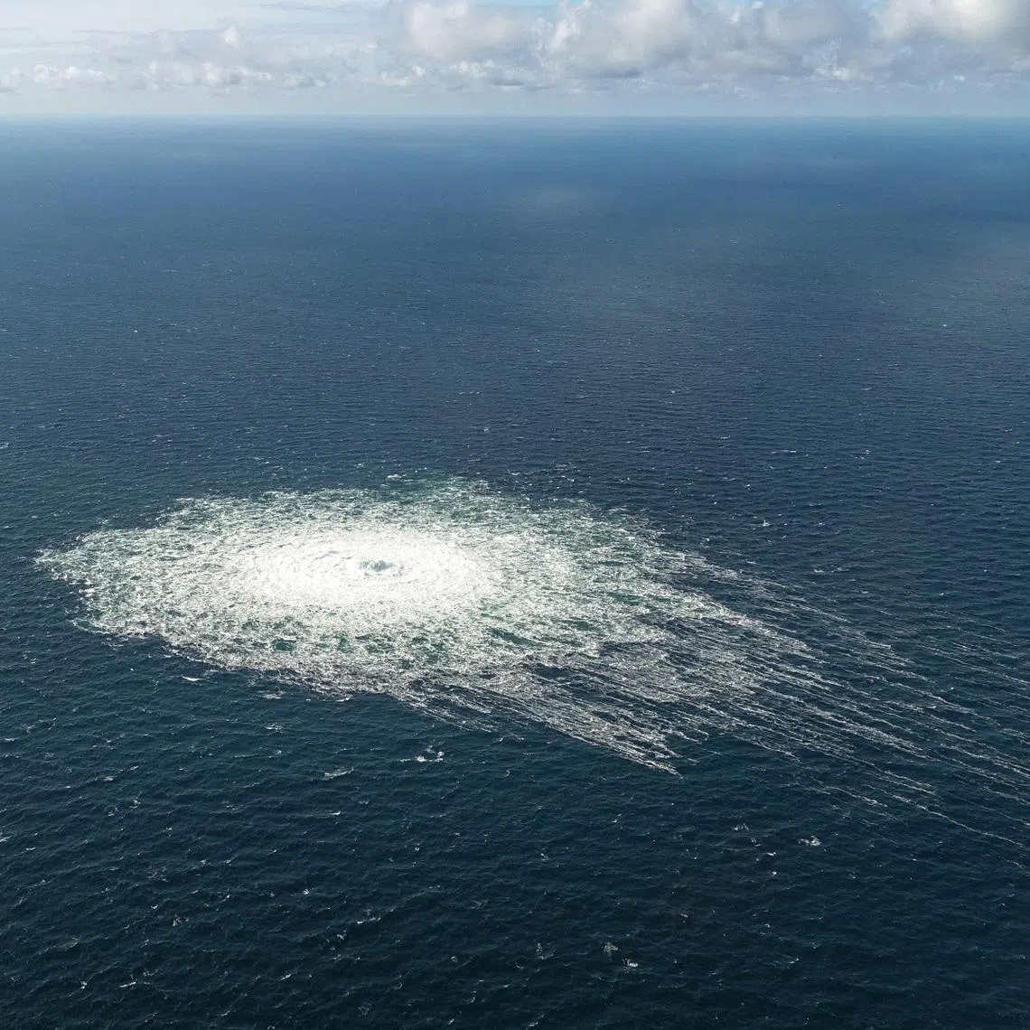 Gas leak from Nord Stream 2 pipeline as seen from an Danish F-16 interceptor jet over Bornholm island, Denmark, September 27, 2022. Danish Defence Command/Forsvaret Ritzau Scanpix/via REUTERS/File Photo