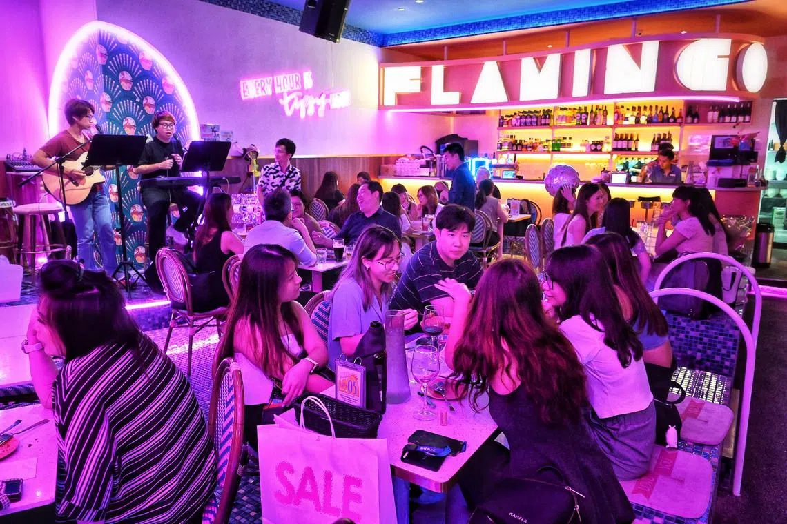 A packed Wednesday night out at the Tipsy Flamingo restaurant-bar at Raffles City Shopping Centre. 