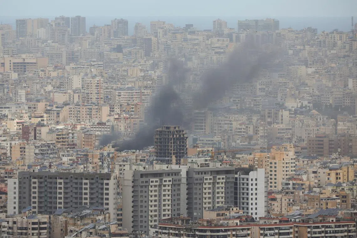 Smoke rises from Beirut's southern suburbs following an Israeli strike, amid escalating hostilities between Israel and Hezbollah, as the U.S.-Israel conflict with Iran continues, Lebanon, March 30, 2026. REUTERS/Adnan Abidi/File Photo