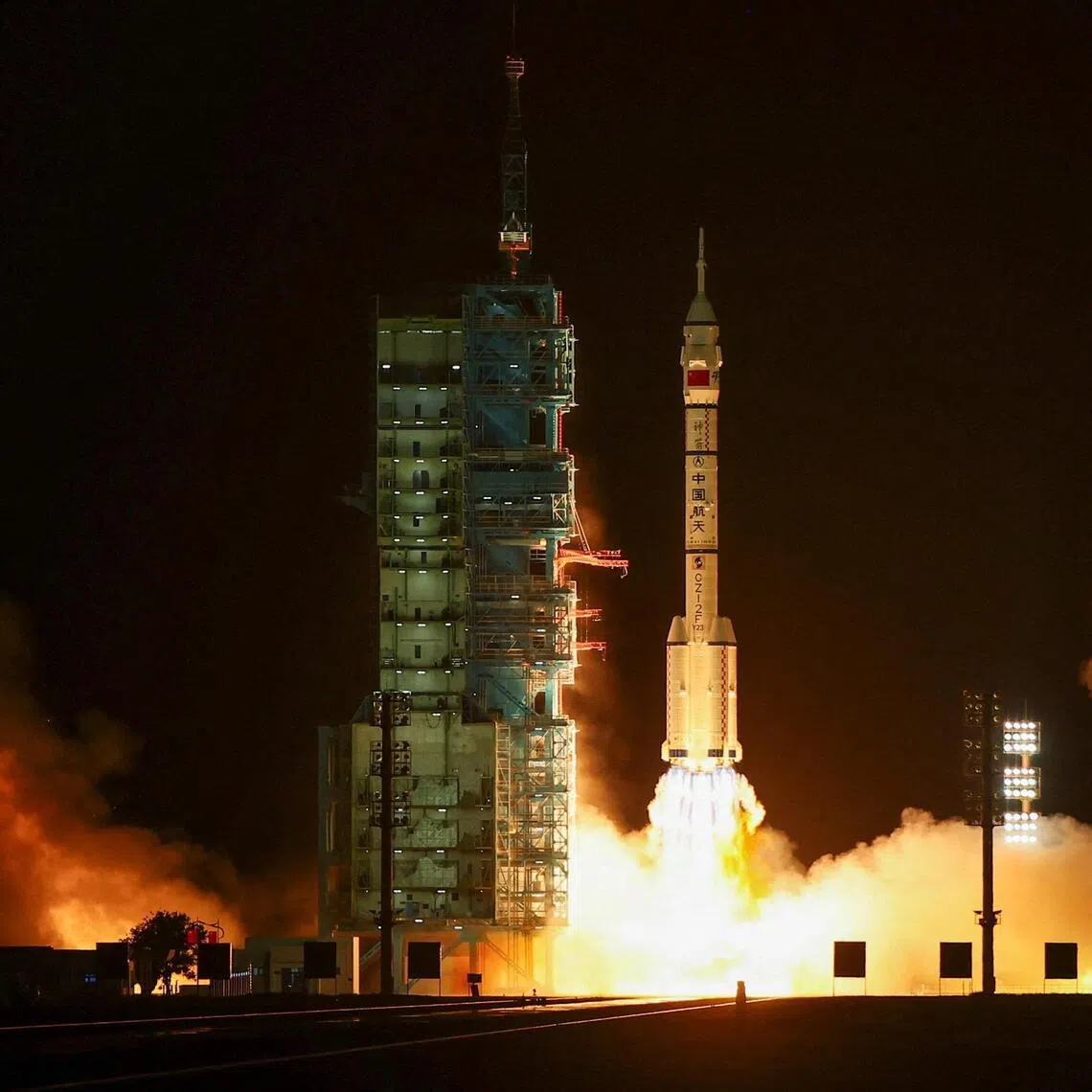 A Long March 2F rocket carrying the Shenzhou-23 spacecraft blasts off from a launch centre in China's north-western Gobi Desert.
