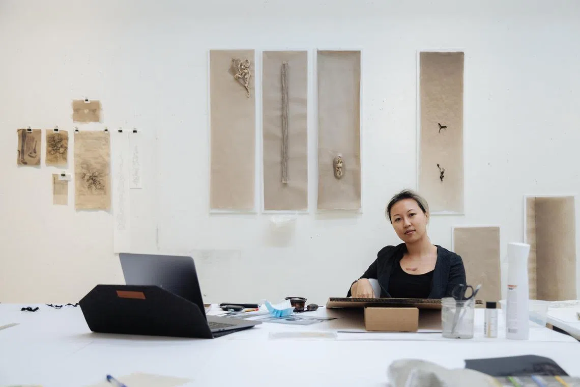 Yanyun Chen experiments with paper in STPI's latest show Departures.