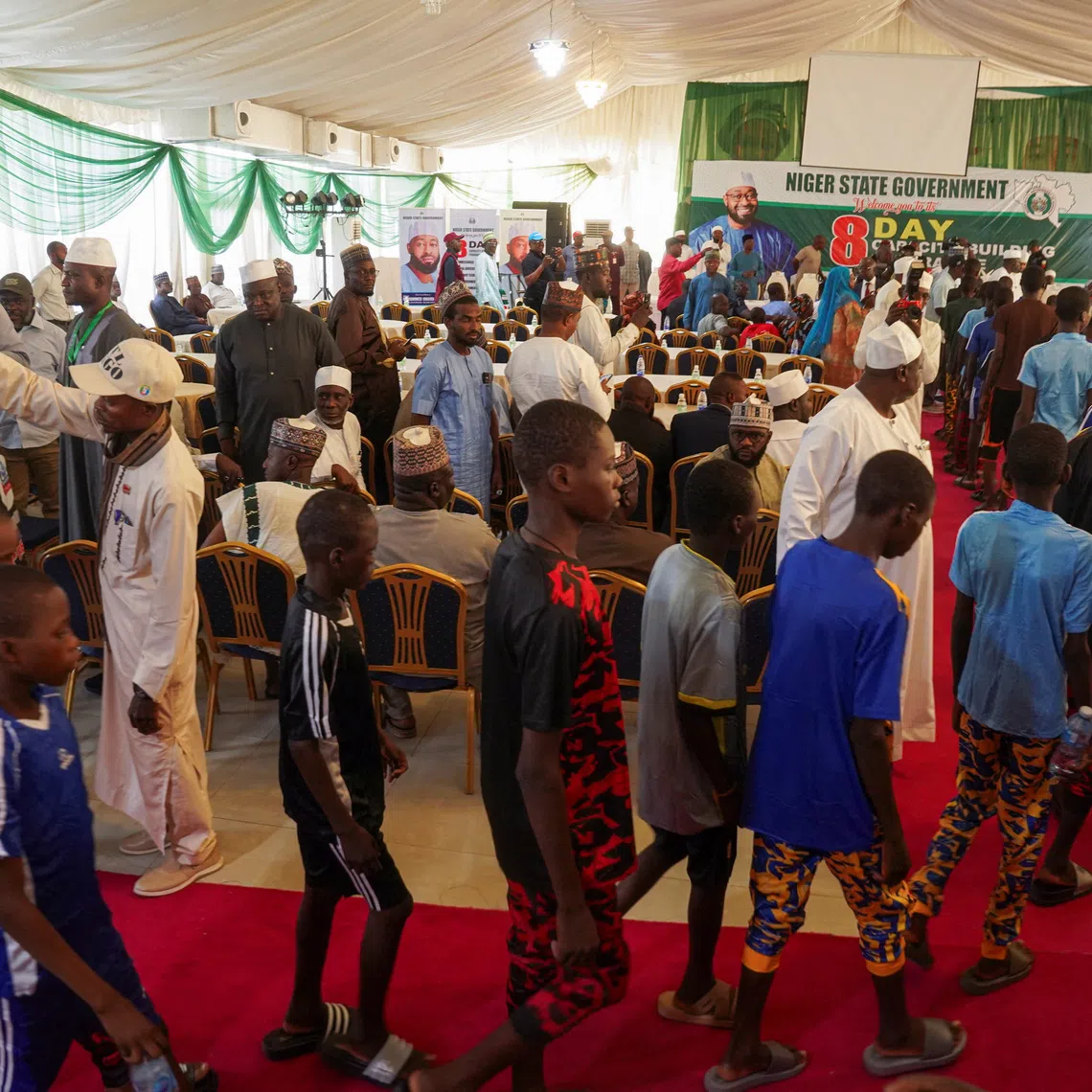 Rescued schoolchildren from St. Mary's School arrive at the Niger State Government House after being freed from captivity following their abduction by gunmen, in Minna, Nigeria, December 8, 2025. REUTERS/Marvellous Durowaiye