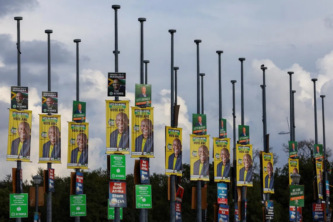FILE PHOTO: Election posters of different political parties are seen, as South Africa prepares for national and provincial elections to be held on May 29, in Pretoria, South Africa, April 5, 2024. REUTERS/Siphiwe Sibeko/File Photo