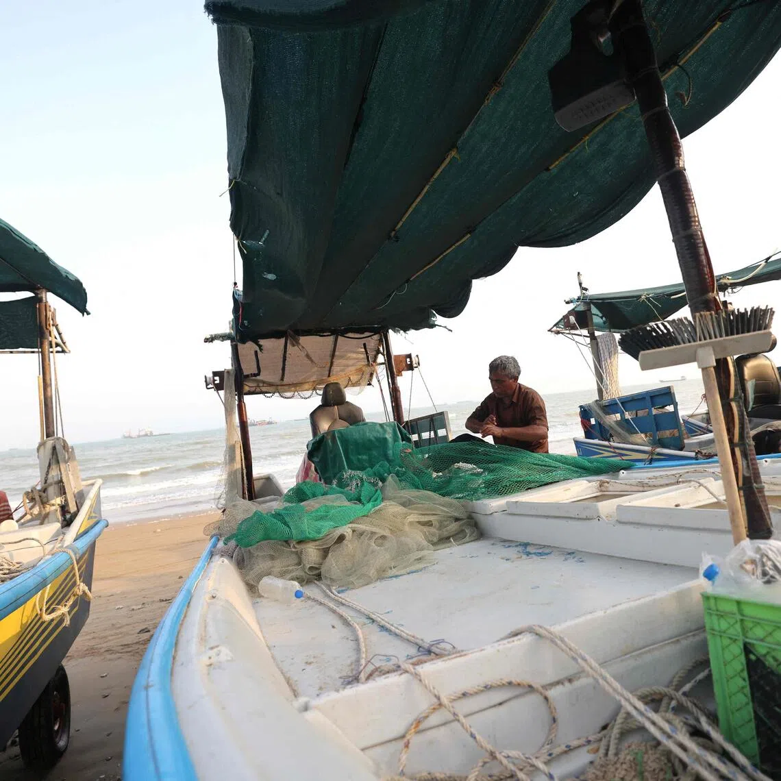 Fishermen in Iran’s port city of Bandar Abbas on Aug 10. Nearly a dozen fishermen were killed off Bandar Abbas and nearby southern islands during months of fighting, according to Iranian media.