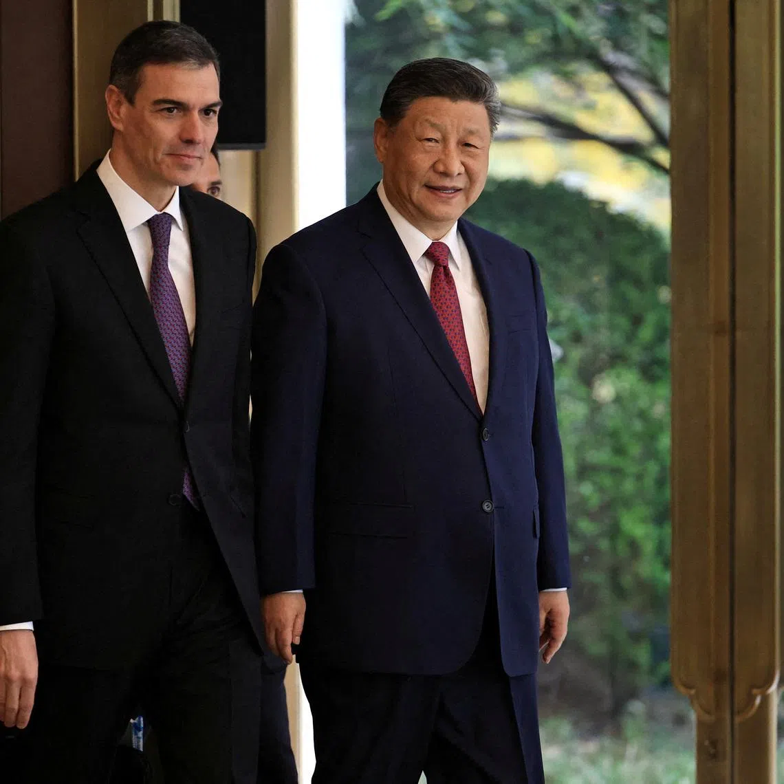 FILE PHOTO: Chinese President Xi Jinping (R) and Spanish Prime Minister Pedro Sanchez (L) arrive to a bilateral meeting at Diaoyutai Guest House in Beijing, China, 11 April, 2025.  ANDRES MARTINEZ CASARES/Pool via REUTERS/File Photo