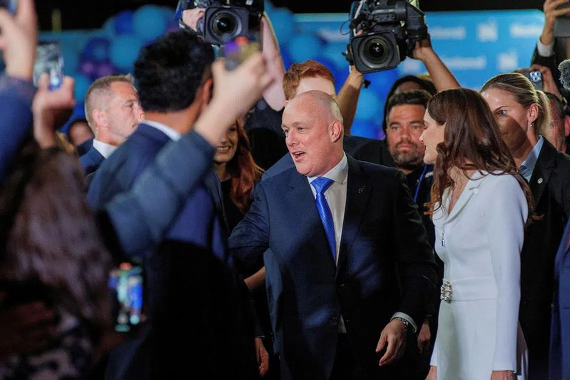 FILE PHOTO: Christopher Luxon, Leader of the National Party arrives at his election party after winning the general election to become New Zealand’s next prime minister in Auckland, New Zealand, October 14, 2023. REUTERS/David Rowland/File Photo