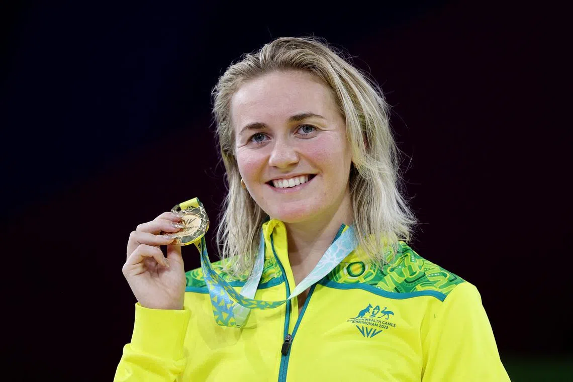 FILE PHOTO: Commonwealth Games - Swimming - Women's 400m Freestyle - Medal Ceremony - Sandwell Aquatics Centre, Birmingham, Britain - August 3, 2022 Gold Medallist Australia's Ariarne Titmus celebrates on the podium during the medal ceremony REUTERS/Stoyan Nenov/File Photo