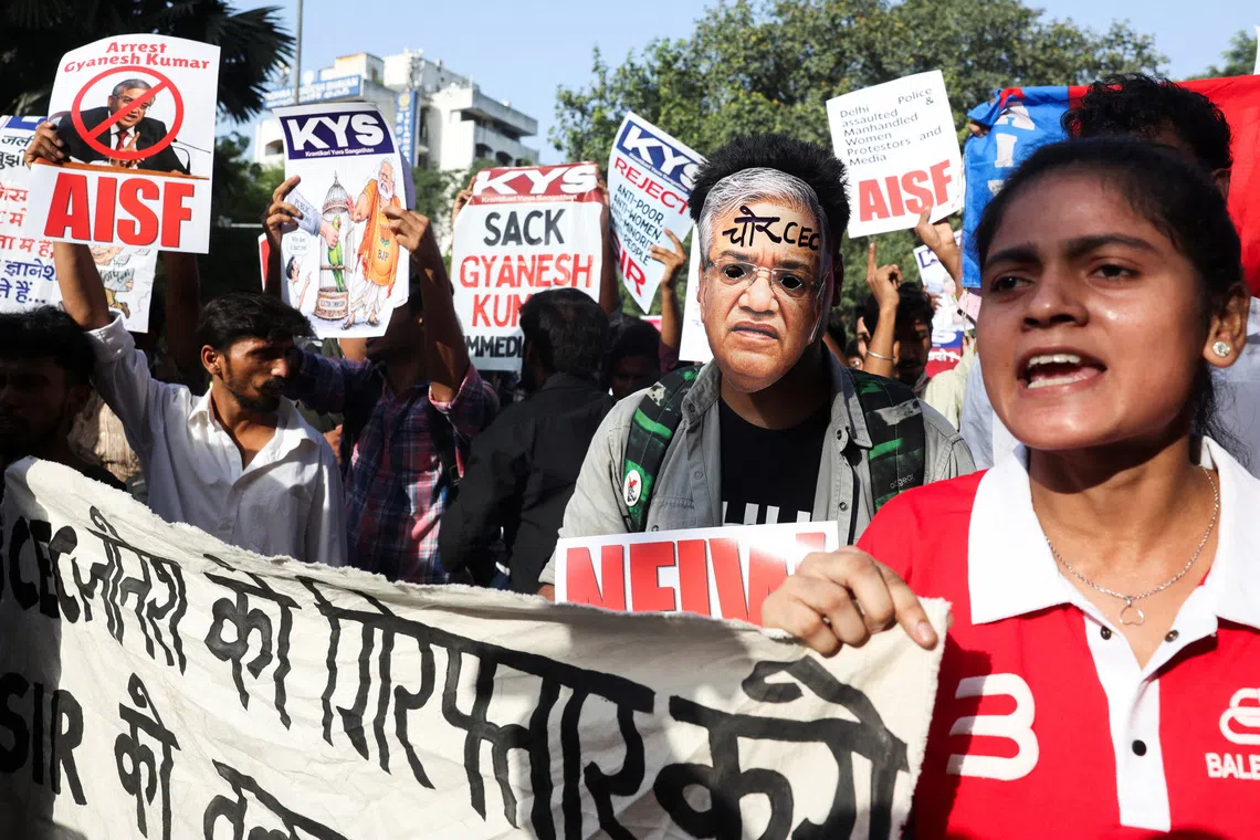 Demonstrators take part in a protest demanding the resignation of Election Commission of India chief Gyanesh Kumar on Oct 4 in New Delhi.