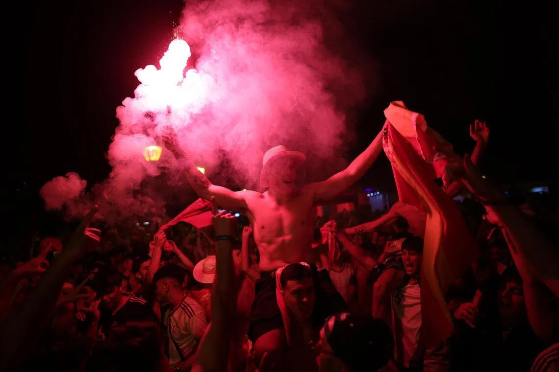 Spain fans celebrating after their side beat Argentina 1-0 to win the World Cup for a second time on July 19.