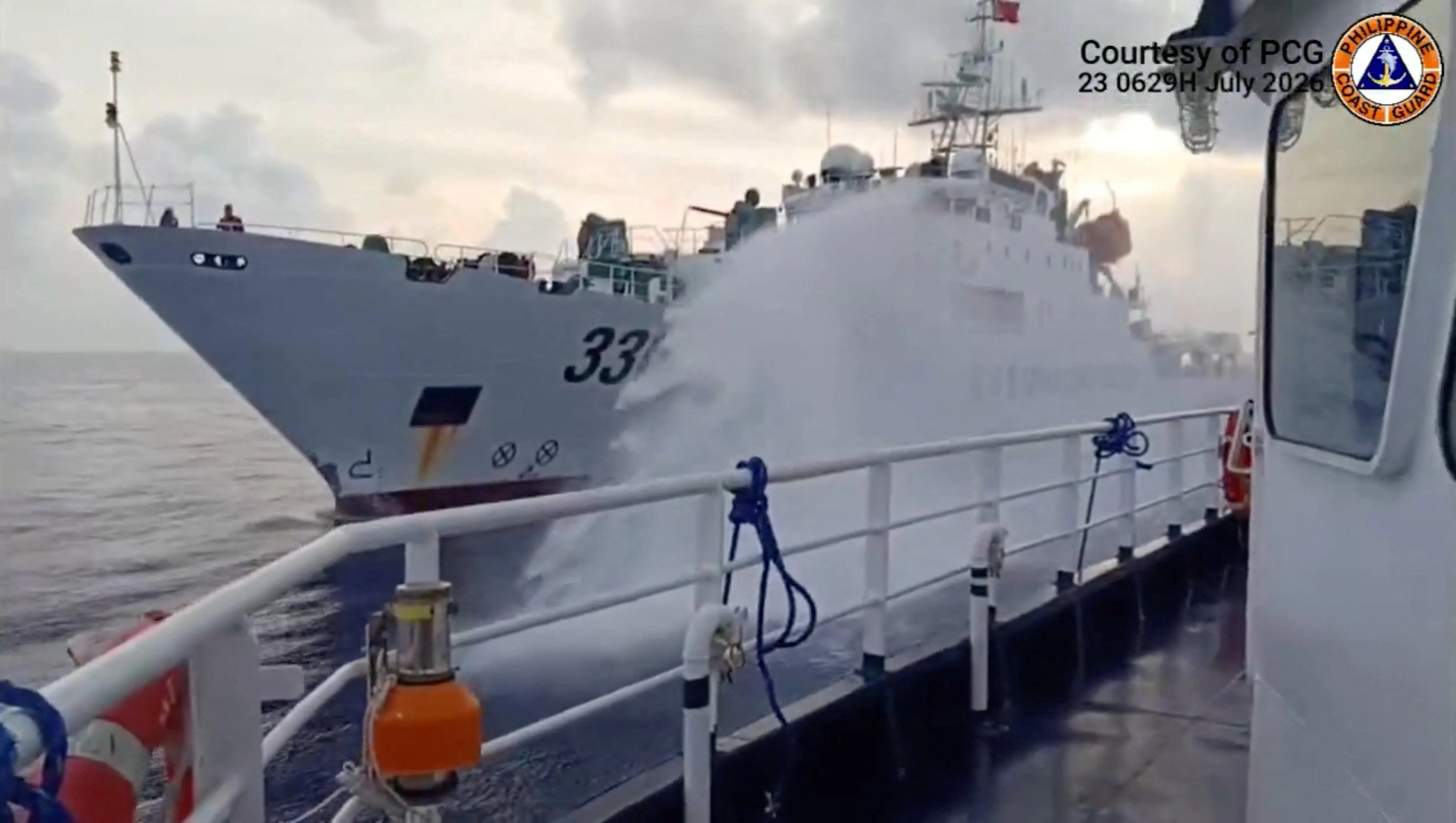 A Chinese coast guard ship fires a water cannon at a Philippine vessel, in this screengrab taken from a handout video released on July 23, 2026, location given as South China Sea. Jay Tarriela via X/Handout via REUTERS    THIS IMAGE HAS BEEN SUPPLIED BY A THIRD PARTY MANDATORY CREDIT

VERIFICATION:
-Reuters was not able to independently verify the date and location when the video was filmed
-Philippines Coast Guard on Thursday (July 23) said a Chinese coast guard vessel fired water cannon at a Philippine fisheries vessel on July 23.
-Exterior and structure of the Chinese flagged on vessel matched file images of China Coast Guard ships
-No older version of the footage was found posted online before July 23