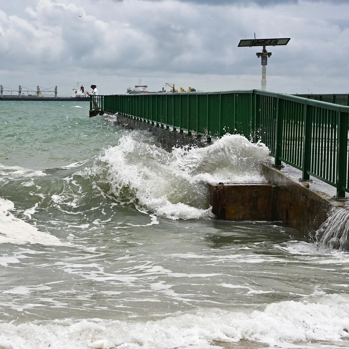 ST20260107-202647600107-Lim Yaohui-pixgeneric/ 3.3m high tide at East Coast Park fishing pier at Area B at 2.09pm on Jan 7, 2026. Tide levels of 3m and above are considered higher than normal, according to PUB. According to NEA (https://www.nea.gov.sg/corporate-functions/weather/tide-timings), there is a high tide of 3.3m at 1.24pm on Jan 7, 2026. During high tide periods, water level can get quite high and seawater can overflow to the surrounding areas especially when combined with heavy rainfall. Spring tides are a natural phenomenon that happens when the Sun, Moon and Earth are aligned, resulting in the gravitational pull of the Sun to be added to that of the Moon's. With climate change and rising sea levels, the risk of transient flooding at coastal areas due to the combined effects of high tides and heavy rainfall would be heightened over the long term. (ST PHOTO: LIM YAOHUI)