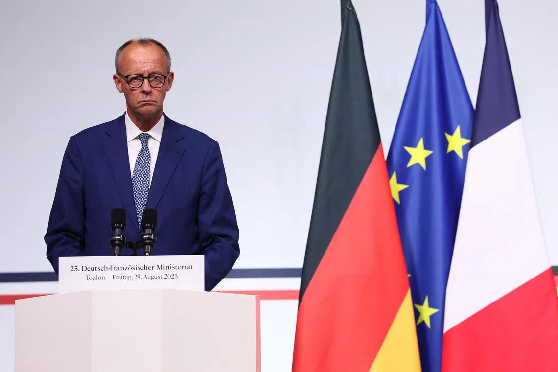 German Chancellor Friedrich Merz taking part in a press briefing with French President Emmanuel Macron (not seen) in Toulon, France, on Aug 29.