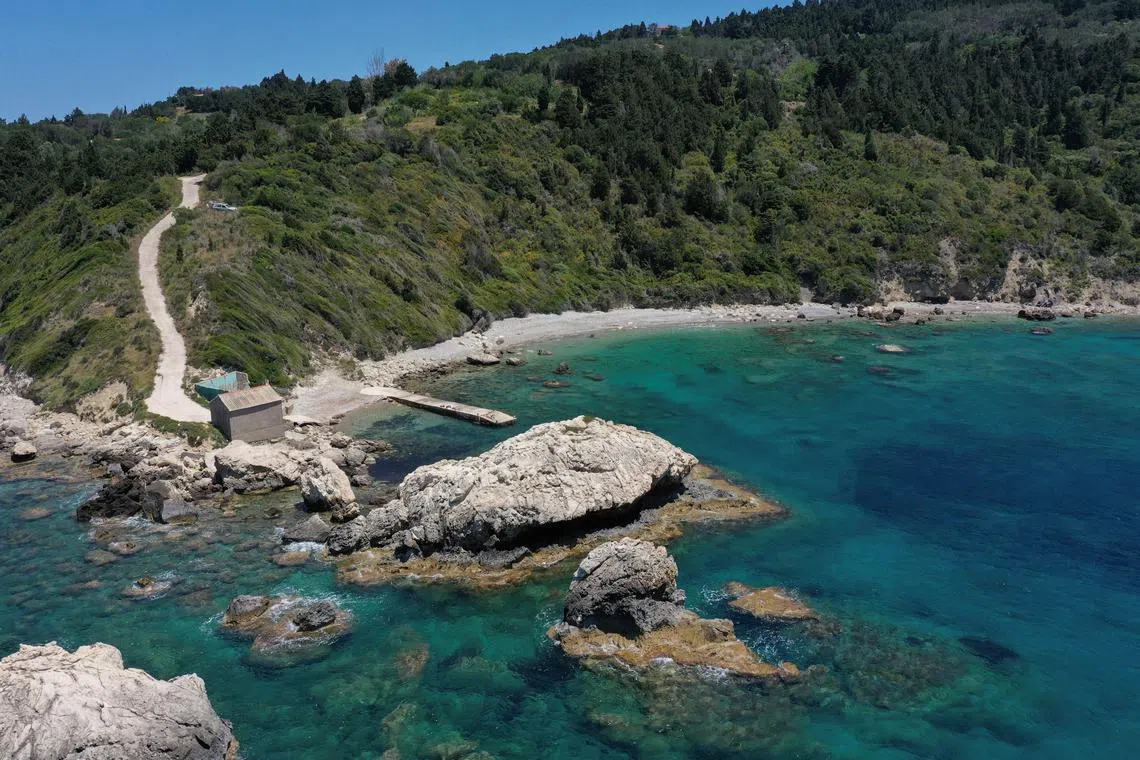 A drone view shows a beach where the body of a 55-year-old American was found, on the island of Mathraki, Greece, June 18, 2024. REUTERS/Adonis Skordilis/File Photo