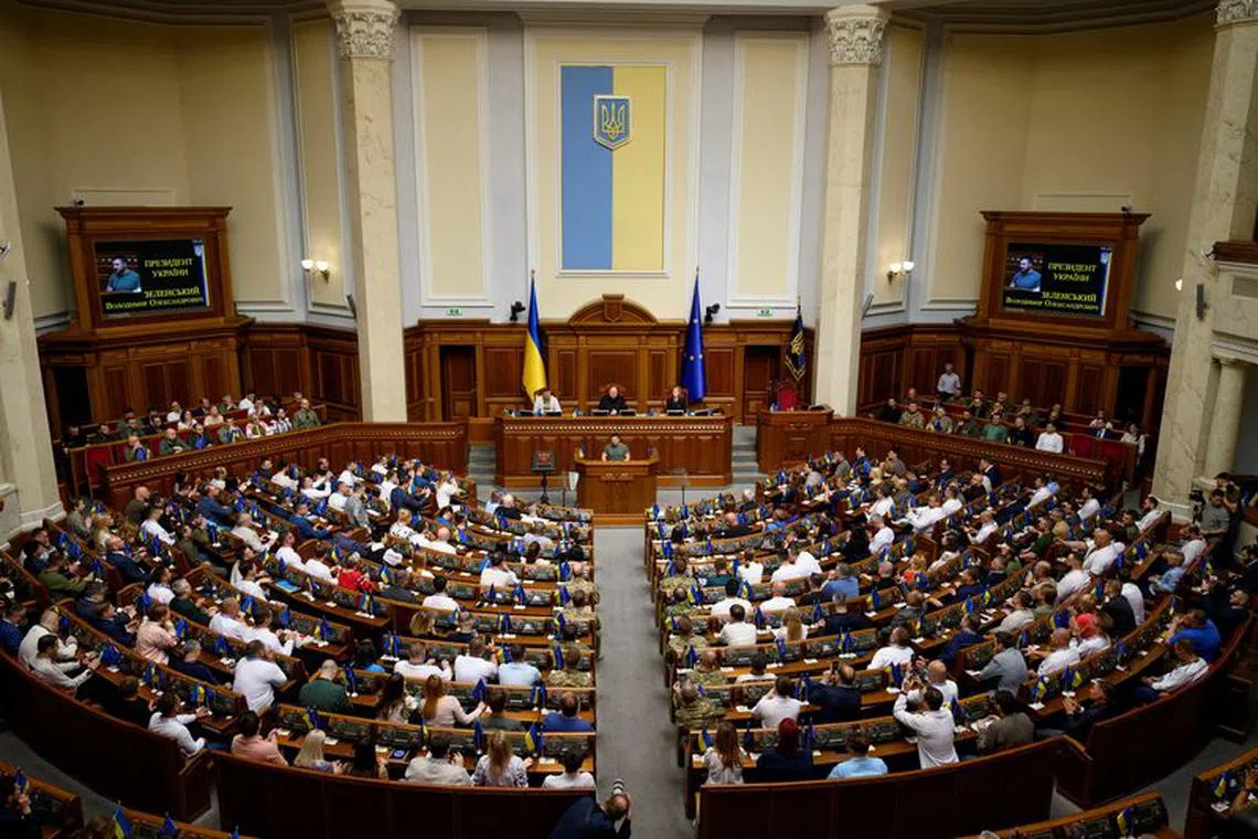 Ukraine's President Volodymyr Zelenskiy addresses lawmakers during a session of the Ukrainian parliament dedicated the Constitution Day, amid Russia's attack on Ukraine, in Kyiv, Ukraine June 28, 2023. Ukrainian Presidential Press Service/Handout via REUTERS/File photo