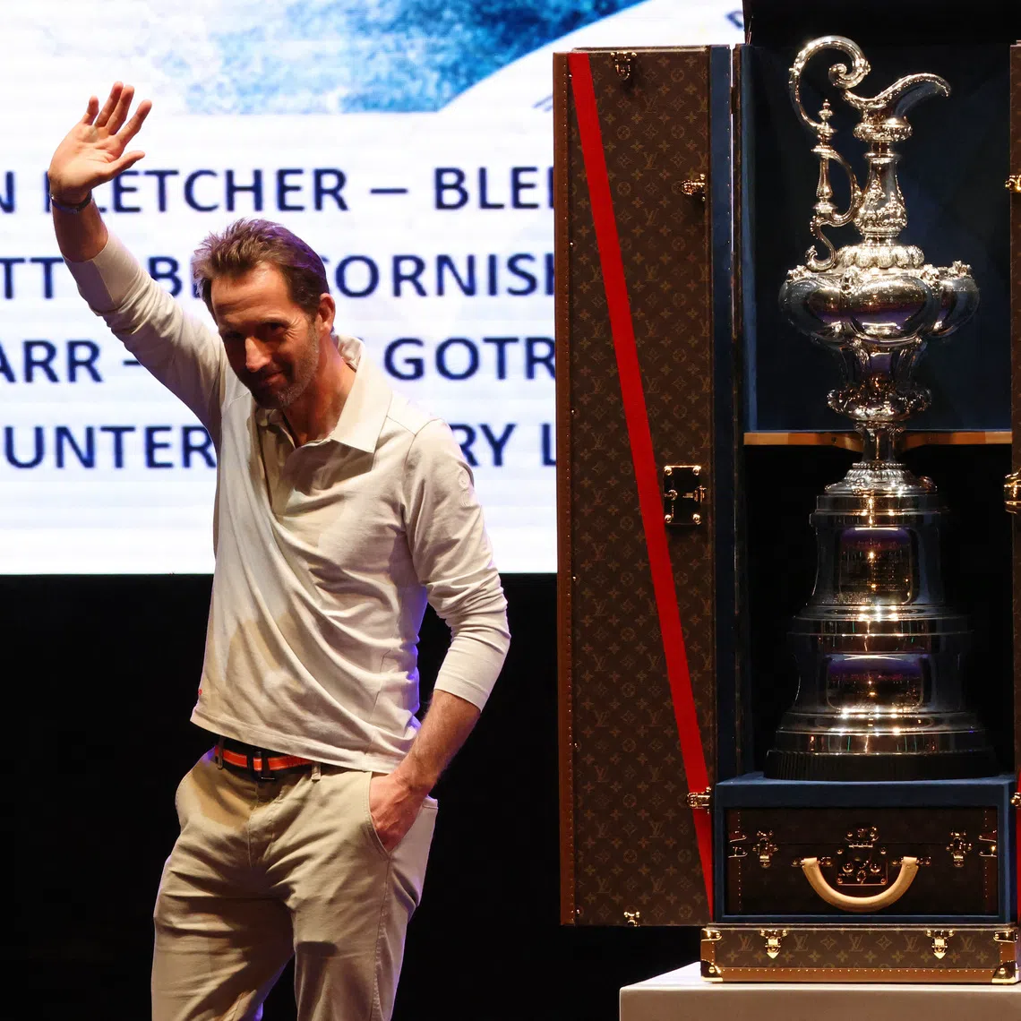 Sailing - 37th America's Cup - New Zealand v Britain - Barcelona, Spain - October 19, 2024 Ineos Britannia's Ben Ainslie is seen on the podium during the trophy ceremony after the 37th America's Cup REUTERS/Nacho Doce