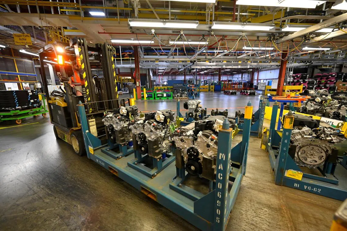 FILE PHOTO: Engines arrive on the assembly line at the General Motors (GM) manufacturing plant in Spring Hill, Tennessee, U.S., August 22, 2019. Picture taken August 22, 2019. REUTERS/Harrison McClary/File Photo
