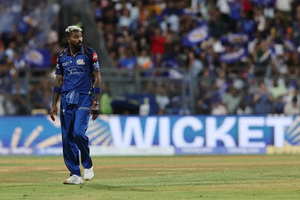 Cricket - Indian Premier League - IPL - Mumbai Indians v Kolkata Knight Riders - Wankhede Stadium, Mumbai, India - March 29, 2026 Mumbai Indians' Hardik Pandya after taking the wicket of Kolkata Knight Riders' Angkrish Raghuvanshi REUTERS/Francis Mascarenhas