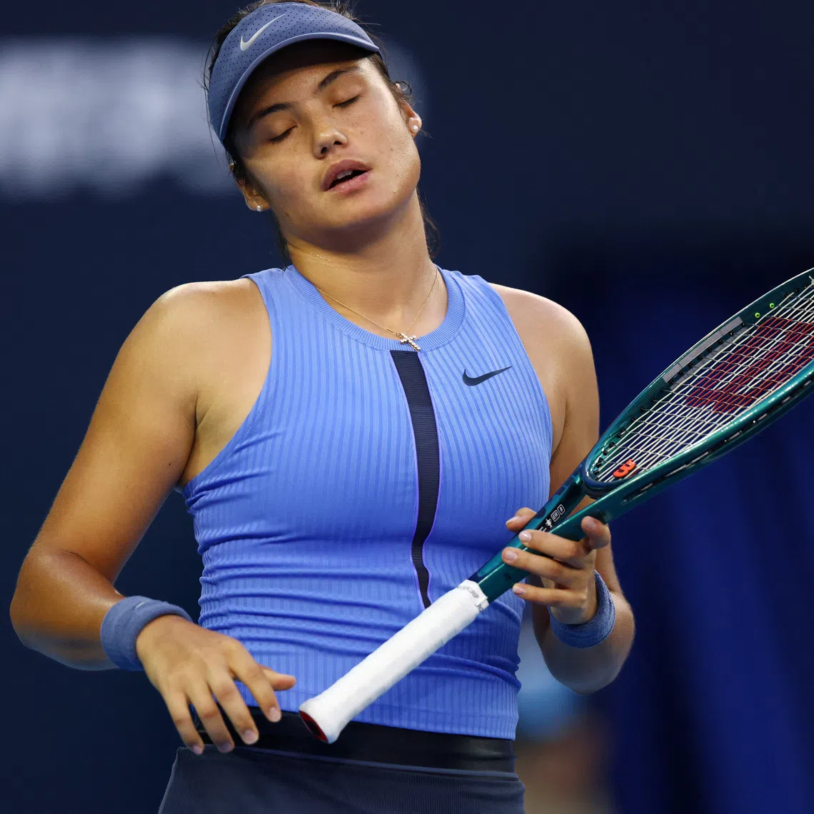 Tennis - China Open - The Beijing Olympic Green Tennis Center, Beijing, China - September 29, 2025 Britain's Emma Raducanu reacts during her round of 32 match against Jessica Pegula of the U.S. REUTERS/Tingshu Wang