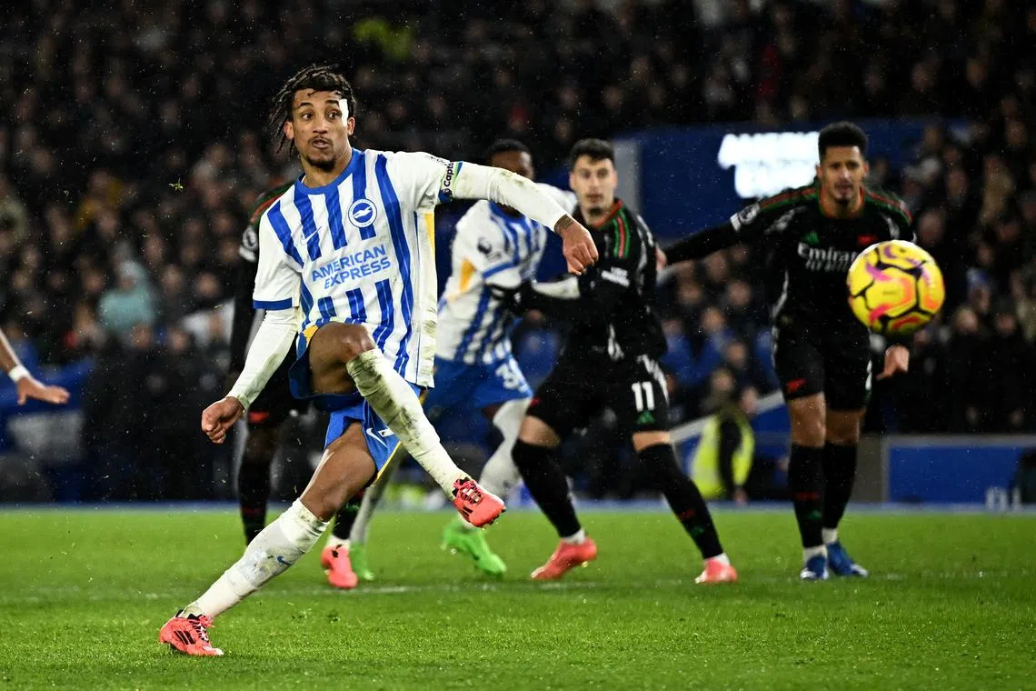 Soccer Football - Premier League - Brighton & Hove Albion v Arsenal - The American Express Community Stadium, Brighton, Britain - January 4, 2025 Brighton & Hove Albion's Joao Pedro scores their first goal from the penalty spot REUTERS/Dylan Martinez