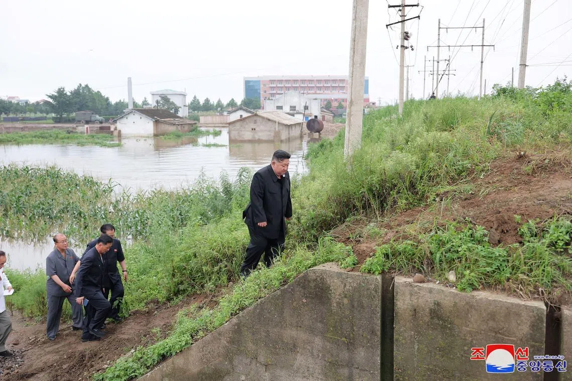 North Korea distributed photos of Mr Kim Jong Un overseeing rescue efforts in the wake of the disaster but did not report any deaths.
