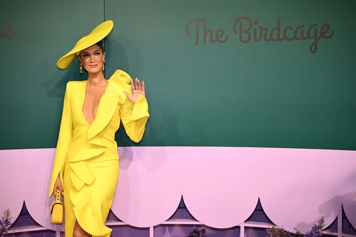 Australian singer Delta Goodrem posing for photographs on arrival to The Birdcage on Melbourne Cup Day at Flemington Racecourse in Melbourne, Australia on Nov 7, 2023. 