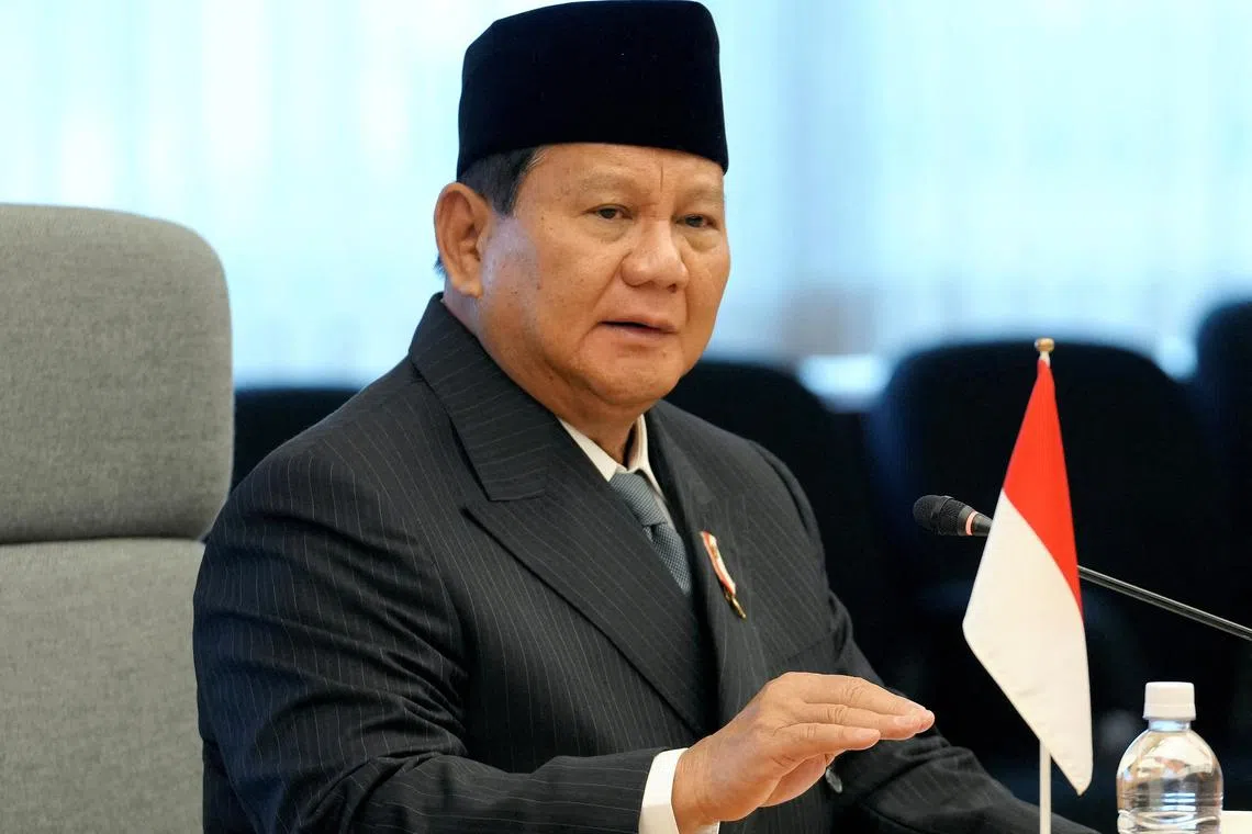 FILE PHOTO: Indonesian Defense Minister and President-elect Prabowo Subianto talks with Japanese Defense Minister Minoru Kihara (not pictured) at the start of their talks at the Defense Ministry in Tokyo, Japan, April 3 2024.   KIMIMASA MAYAMA/Pool via REUTERS/File Photo