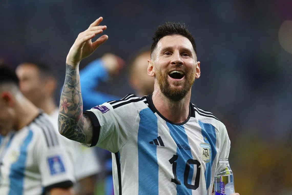 Argentina's Lionel Messi celebrates after the match, as Argentina progress to the quarter finals.