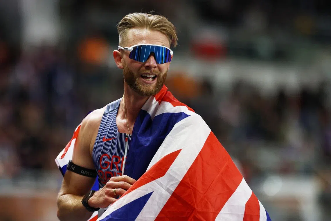 Athletics - World Indoor Championships - Kujawsko-Pomorska Arena, Torun, Poland - March 21, 2026 Britain's Josh Kerr celebrates winning the men's 3000m final REUTERS/Kacper Pempel
