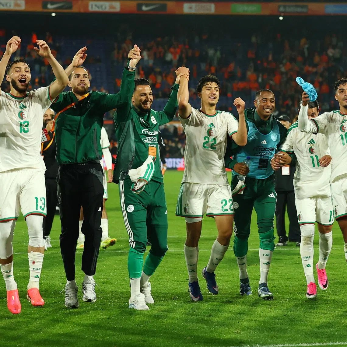 Algeria players celebrate after the match against the Netherlands on June 3. They will face Argentina on June 16 in their opening game in Group J in Kansas City.