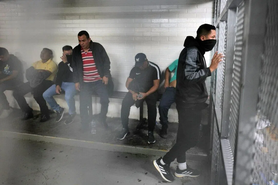 Prison guards being held in a Guatemalan prison on Oct 25. They had been detained after 20 leaders of the Barrio 18 gang escaped. 