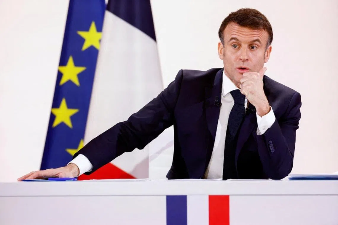 FILE PHOTO: French President Emmanuel Macron speaks during a press conference to answer questions from journalists after naming a new government, at the Elysee Palace in Paris, France, January 16, 2024. REUTERS/Christian Hartmann/File Photo