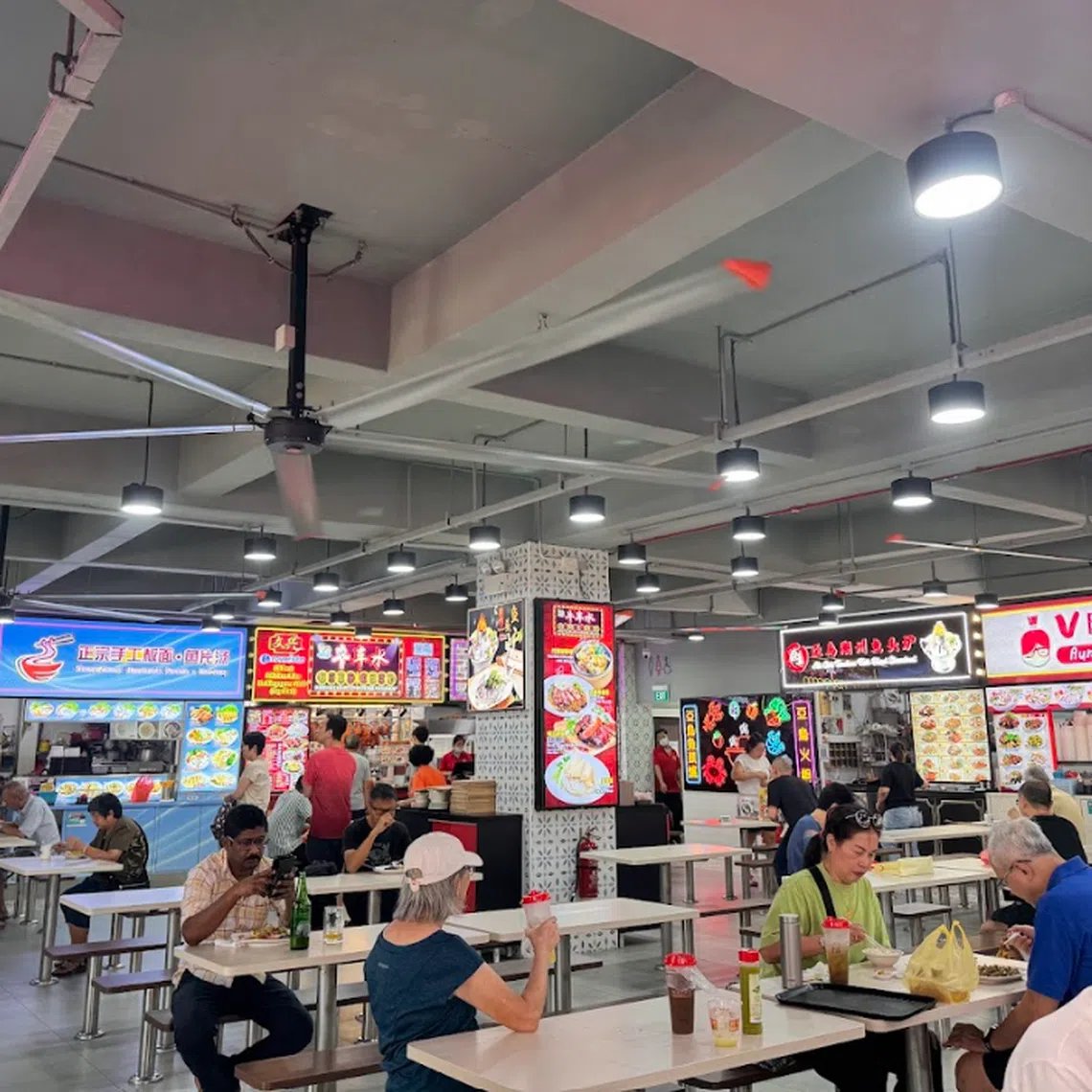 High-volume low-speed fans are used at a coffeeshop in Bedok. 