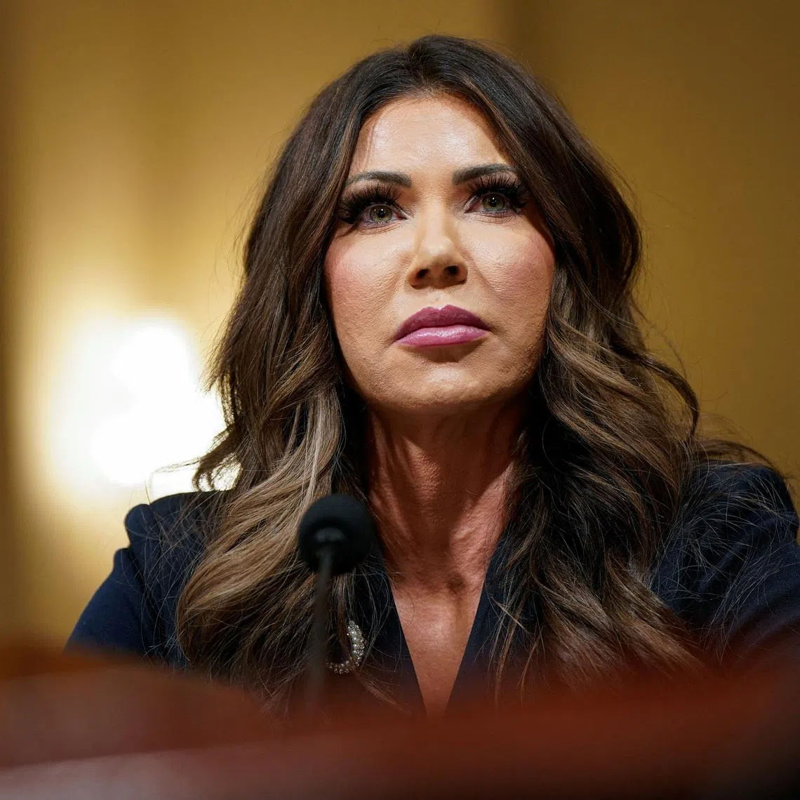 U.S. Homeland Security Secretary Kristi Noem attends a House Homeland Security hearing entitled \"Worldwide Threats to the Homeland,\" on Capitol Hill in Washington, D.C., U.S. December 11, 2025.  REUTERS/Elizabeth Frantz