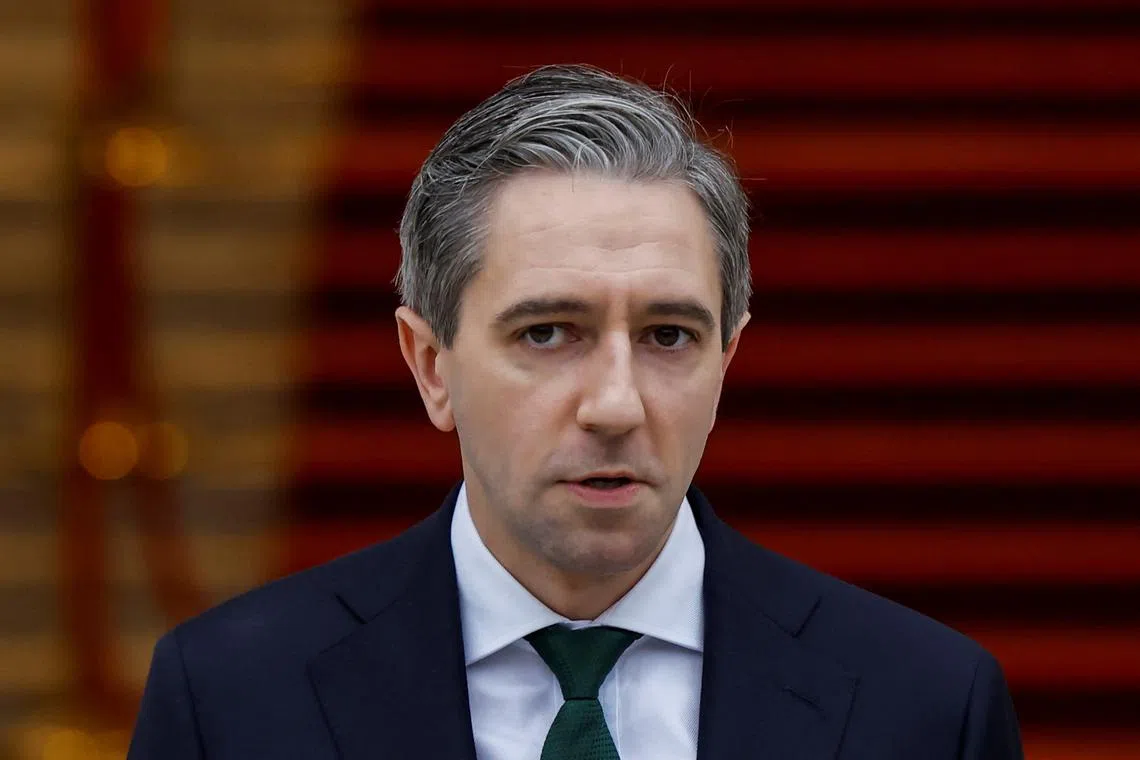 FILE PHOTO: Taoiseach (Prime Minister) Simon Harris makes a statement at Government Buildings calling a General Election, in Dublin, Ireland, November 8, 2024. REUTERS/Clodagh Kilcoyne/File Photo