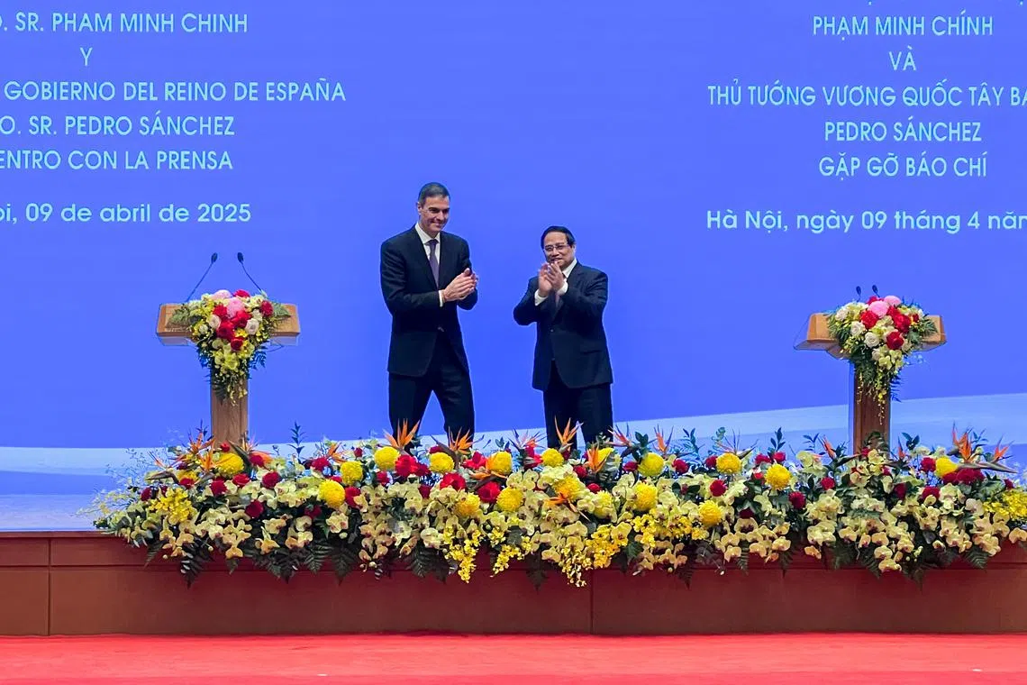 Spain's Prime Minister Pedro Sanchez and Vietnam's Prime Minister Pham Minh Chinh take part in a joint press conference in Hanoi, Vietnam, April 9, 2025. REUTERS/Minh Nguyen