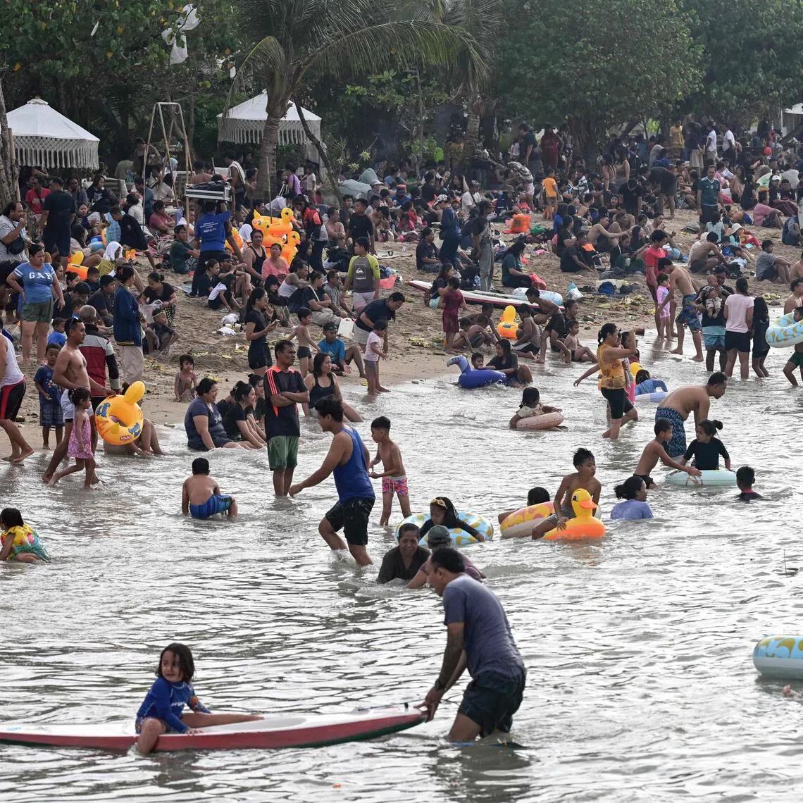 Locals in Bali complain that they are losing access to shorelines where they traditionally hold religious rituals like the Banyu Pinaruh ceremony.
