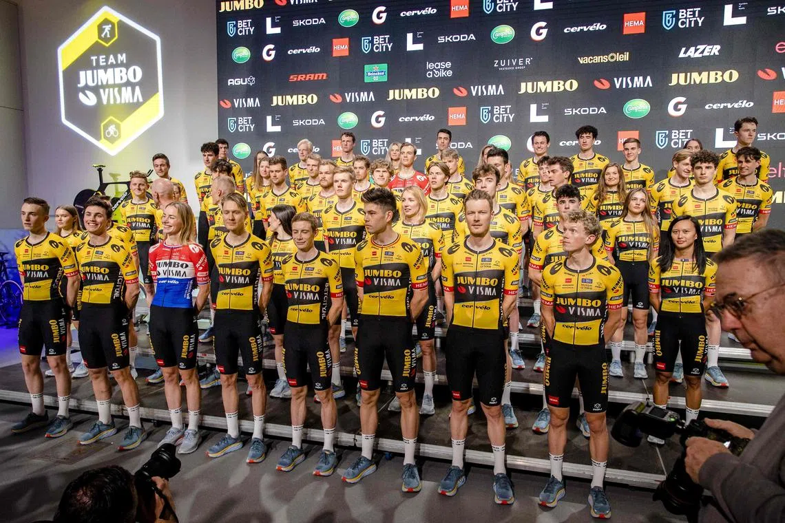 Riders of the Jumbo-Visma 2023 cycling team during the team presentation in Amsterdam on Dec 22, 2022.