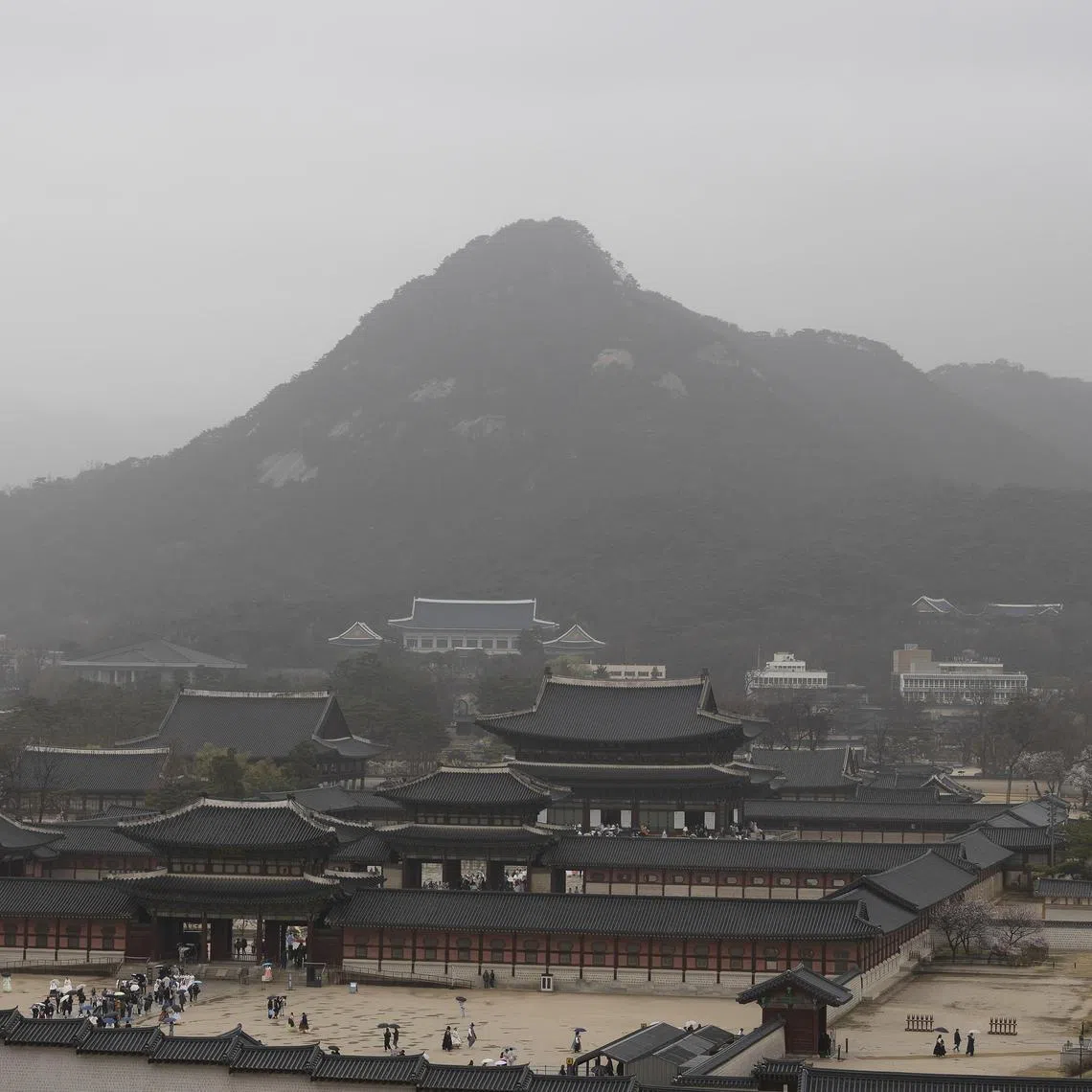 The sky above Seoul's Gyeongbokgung palace could be seen obscured by yellow dust. 