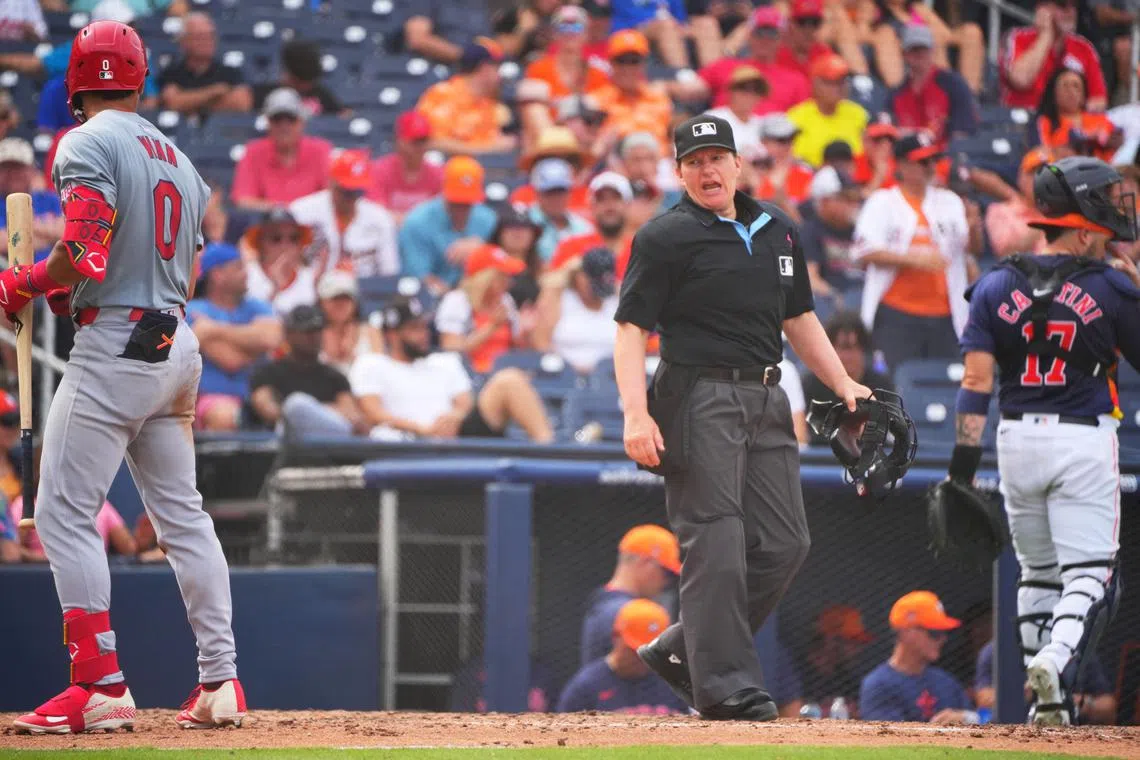 FILE PHOTO: Mar 2, 2024; West Palm Beach, Florida, USA; St. Louis Cardinals shortstop Masyn Winn (0) has a few words for home plate umpire Jen Pawol after striking out in the sixth inning against the Houston Astros at The Ballpark of the Palm Beaches. Mandatory Credit: Jim Rassol-USA TODAY Sports/File Photo